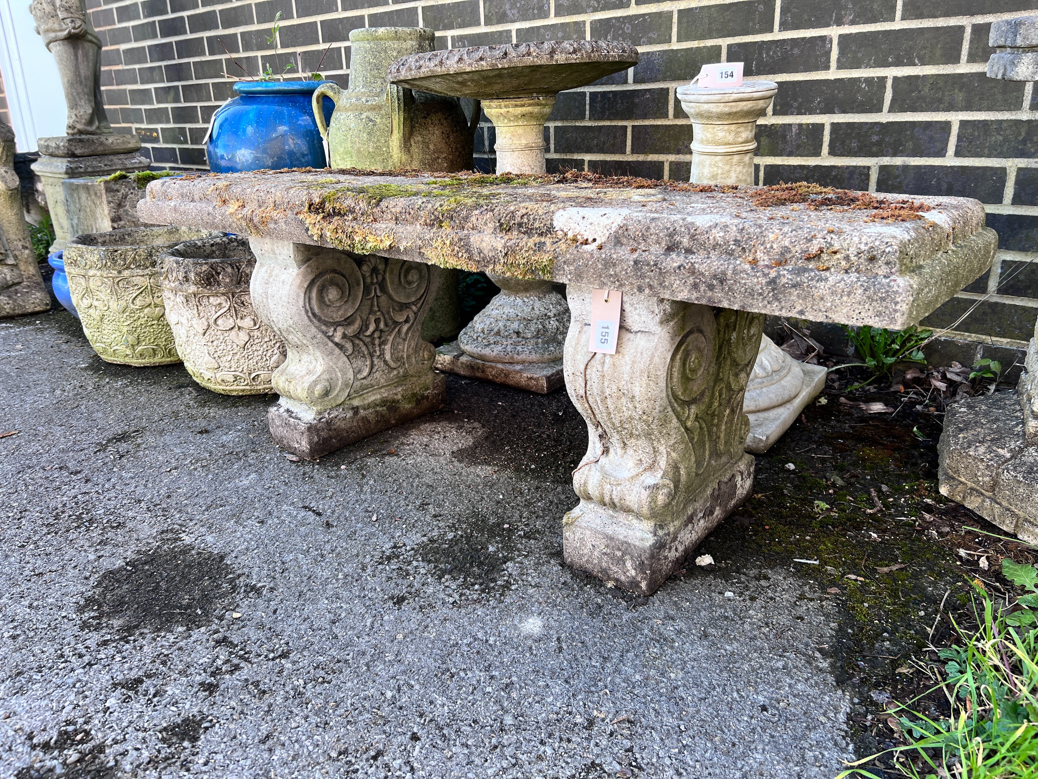 A reconstituted stone garden bench, length 128cm, depth 37cm, height 45cm *Please note the sale commences at 9am.
